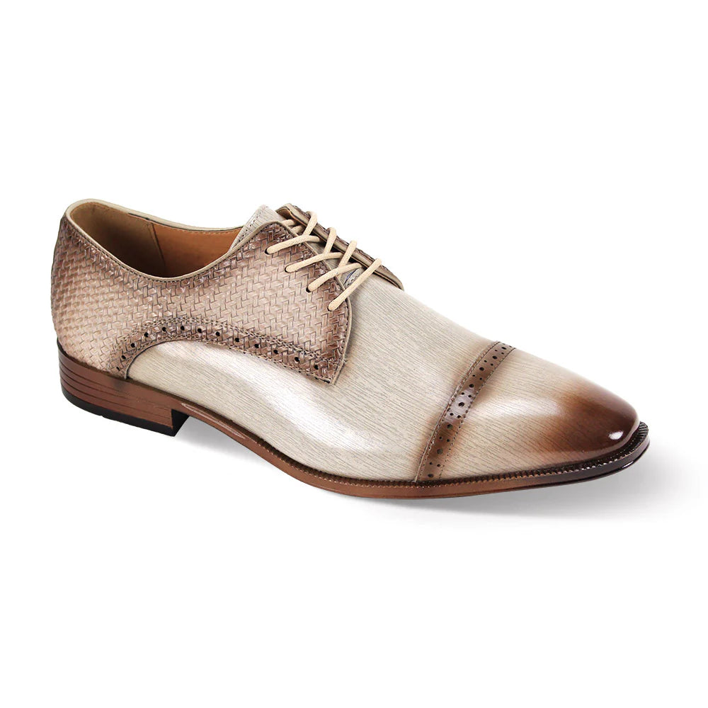 Brown and beige leather dress shoe on a white background