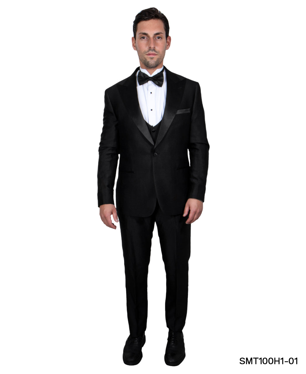 Man wearing a black tuxedo with a white shirt and bow tie on a white background