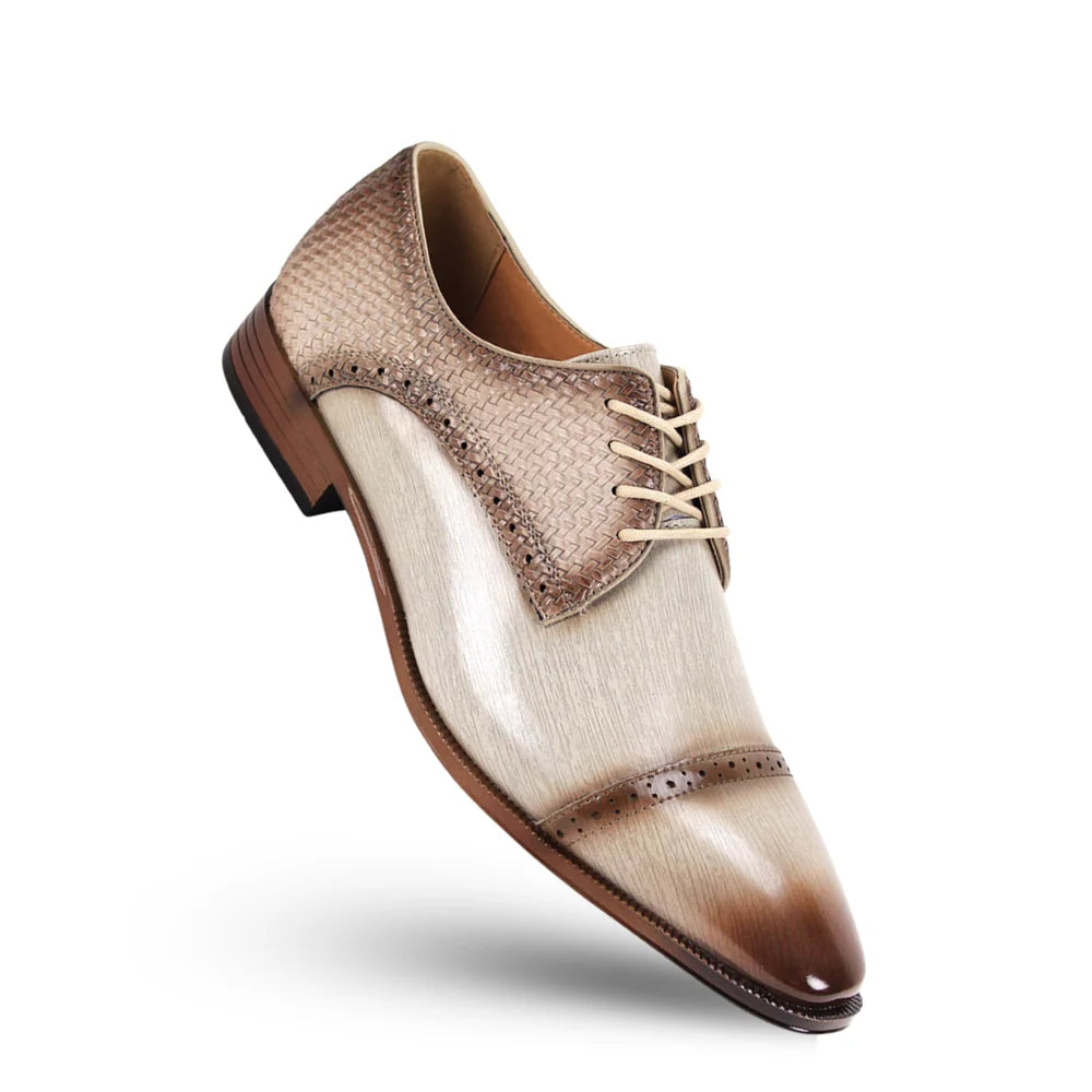 Brown and beige dress shoe on a white background