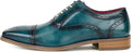 turquoise leather dress shoe on a white background