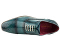 turquoise leather dress shoe with white laces on a white background