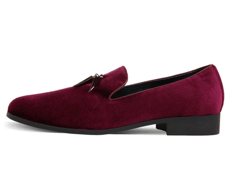 Burgundy loafer shoe on a white background