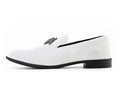 White loafer shoe with a black buckle on a white background