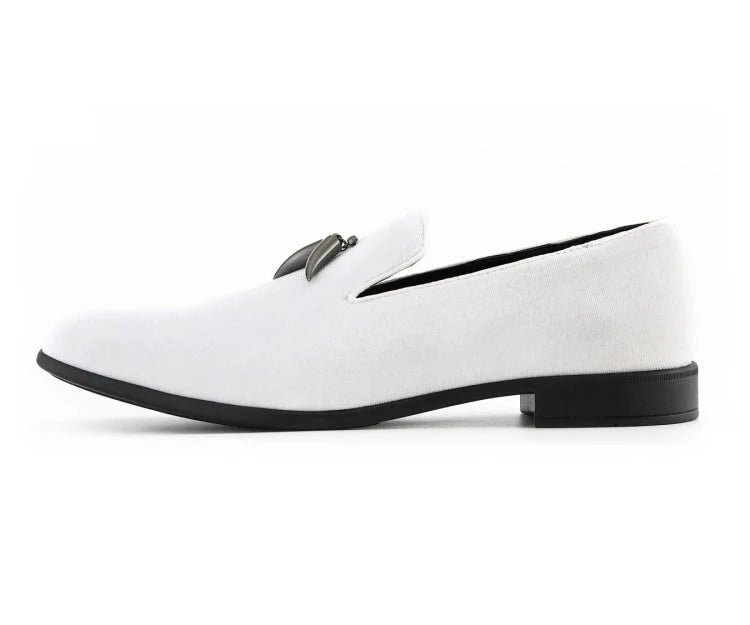 White loafer shoe with a black buckle on a white background