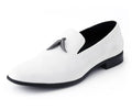 White loafer shoe with black sole on a white background